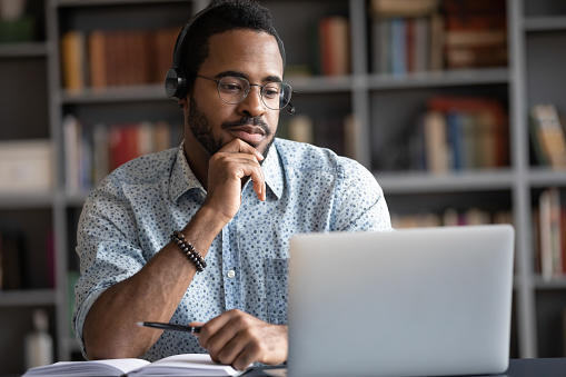 job seeker watches video on laptop