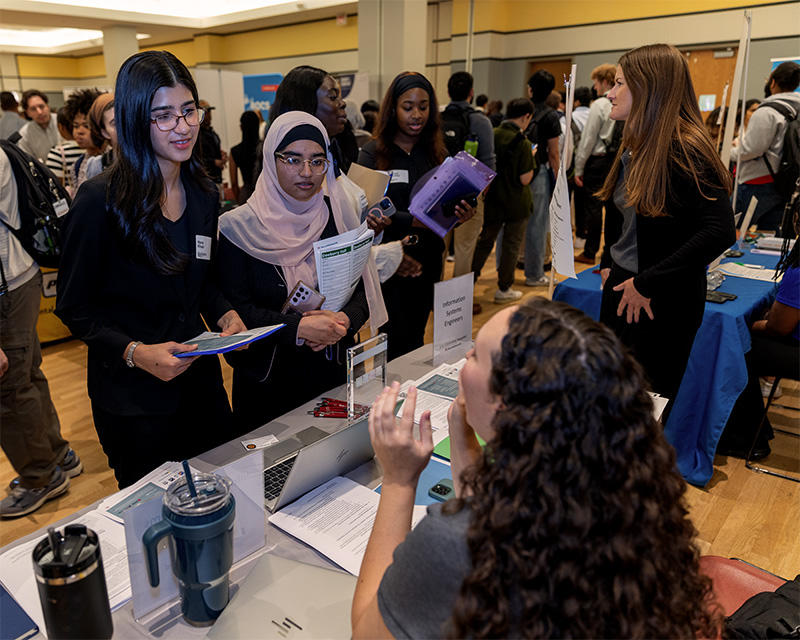 George Mason University students speak to recruiters at the Career Fair